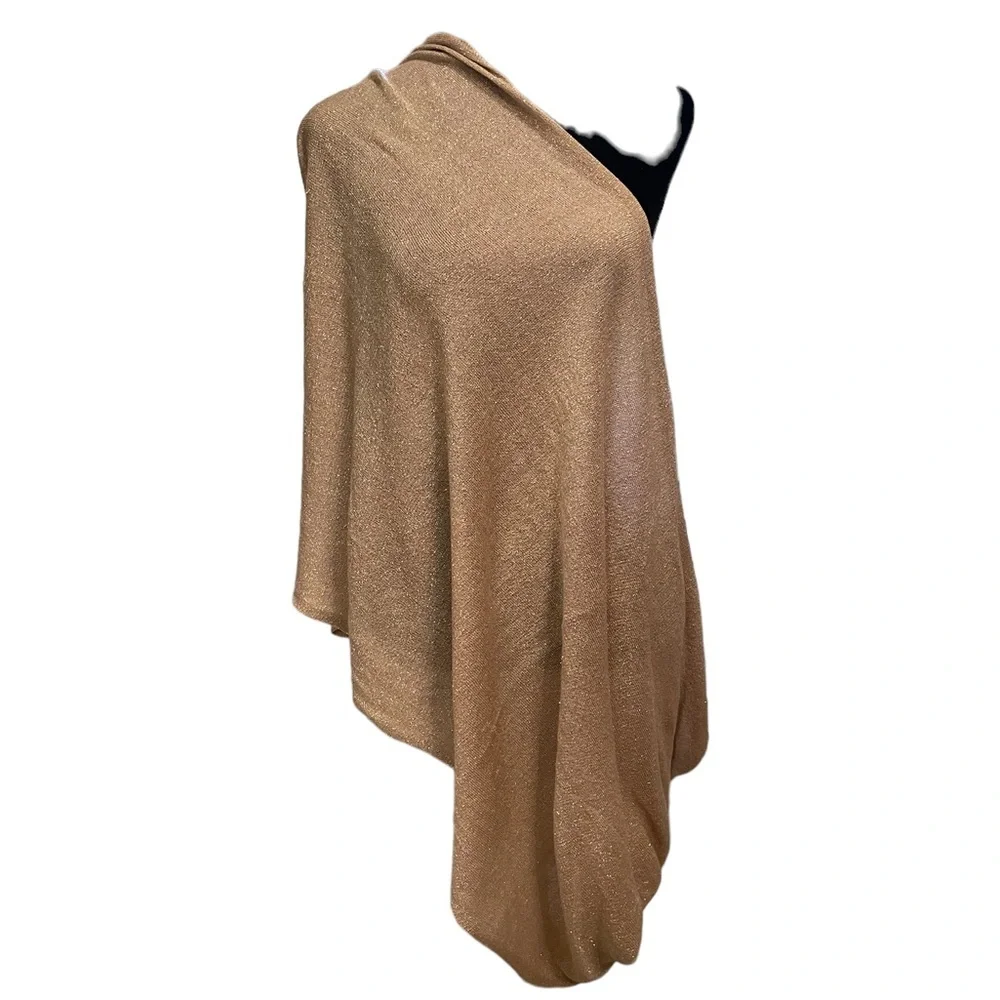 Pale pink infinity scarf with‎ gold threads.